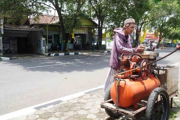 **Penambal Ban di Pati: Kisah Heru yang Rela JKN Sebagai Nyawa Keluarganya**